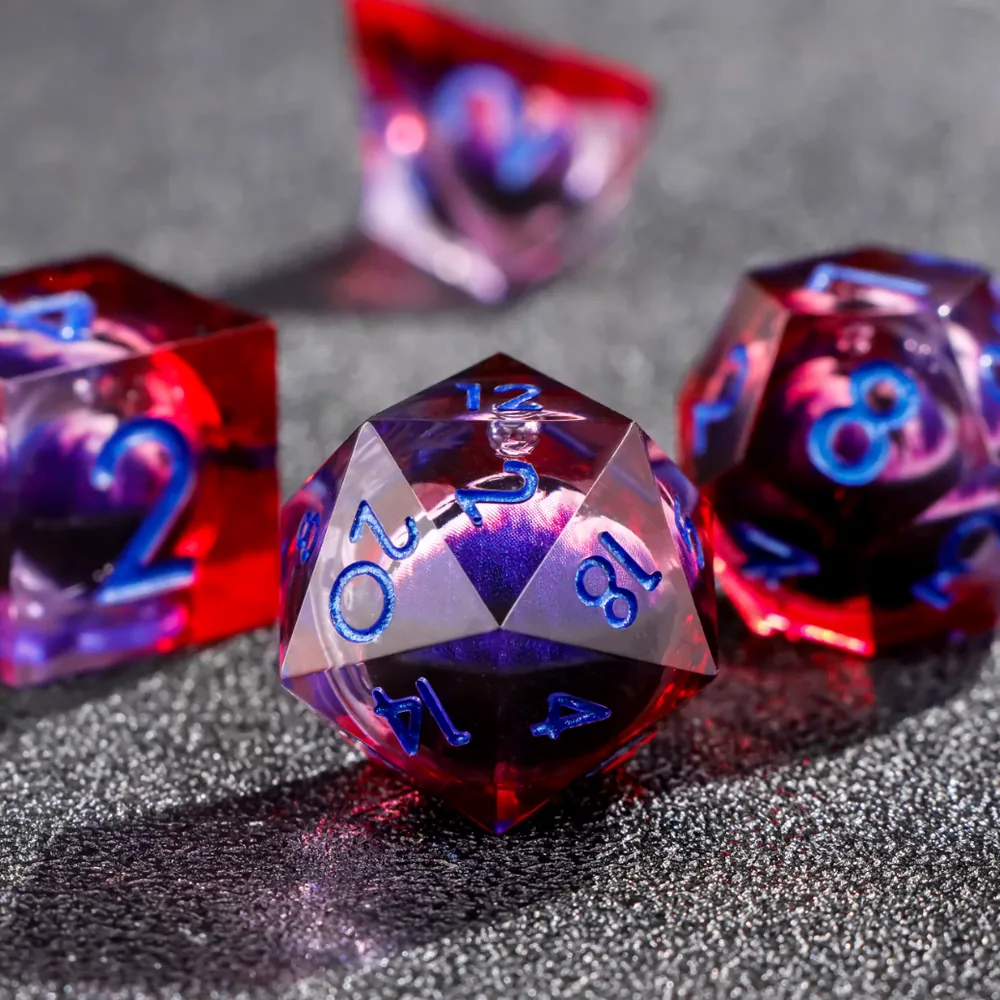 Bloodmoon d20 resting on a dark mat with blue numbers